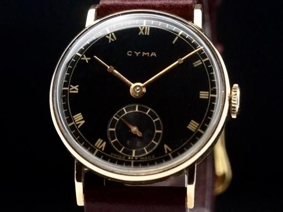 CYMA / 9KYG 'DENNISON' CASE, BLACK GILT DIAL 1947