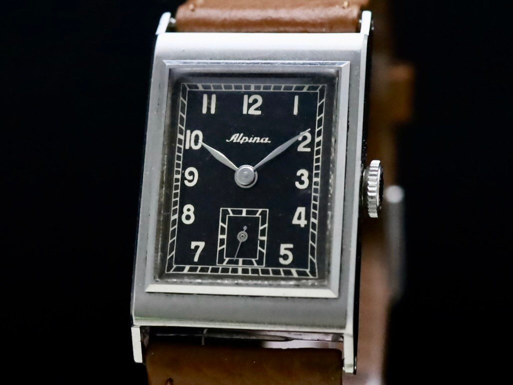 Alpina / SS RECTANGULAR, BLACK SILVER GILT DIAL 1940'S