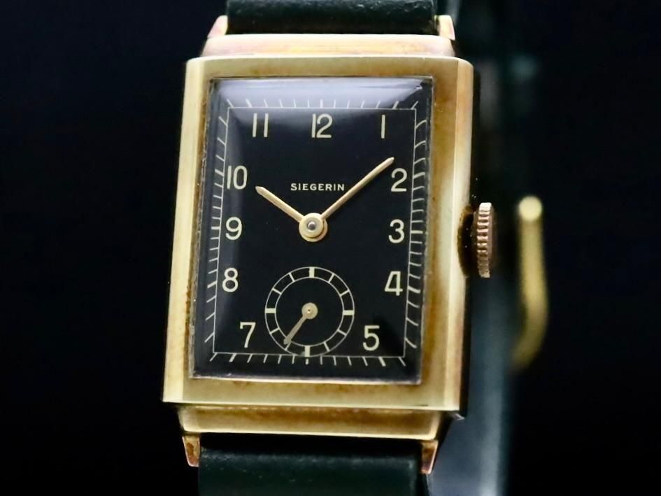 Siegerin by Alpina-Gruen / 14KYG RECTANGULAR, BLACK GILT DIAL 1930'S