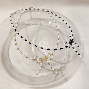 <img class='new_mark_img1' src='https://img.shop-pro.jp/img/new/icons20.gif' style='border:none;display:inline;margin:0px;padding:0px;width:auto;' />chelsea import beads ribbon necklace